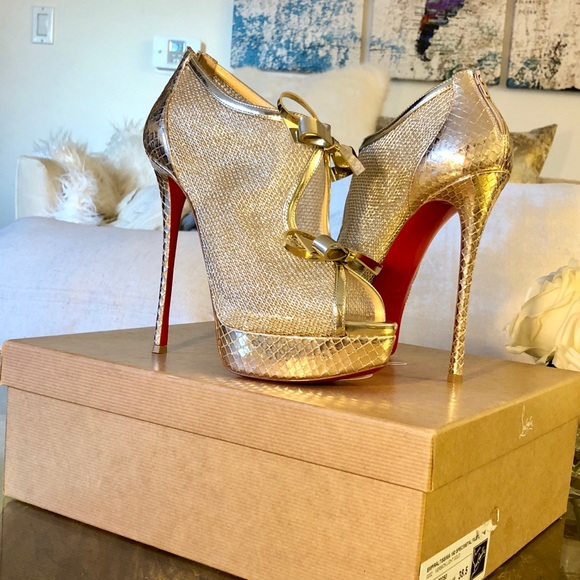 Christian Louboutin Shoes - NEW- Christian Louboutin Gold Bow Tie Booty